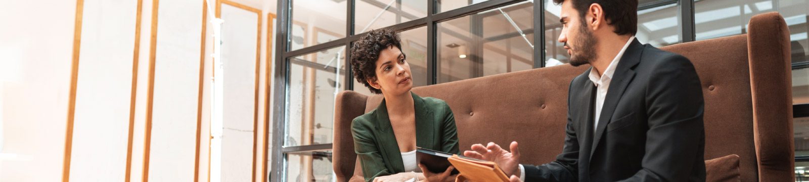 Man and woman in a financial planning conversation